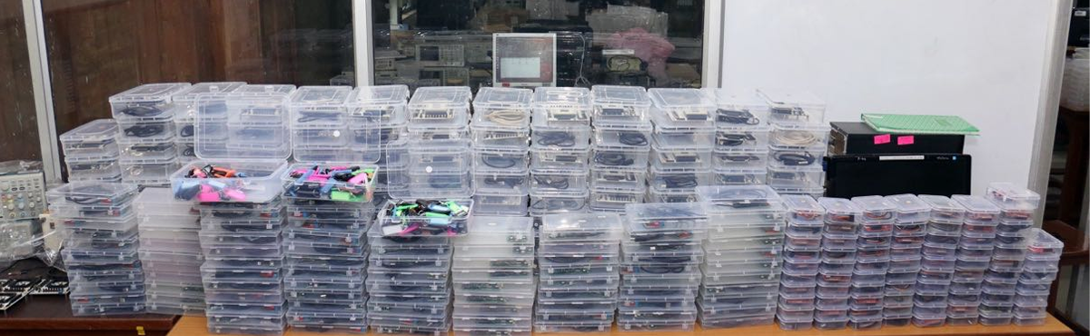 Packed kits stacked and ready for despatch